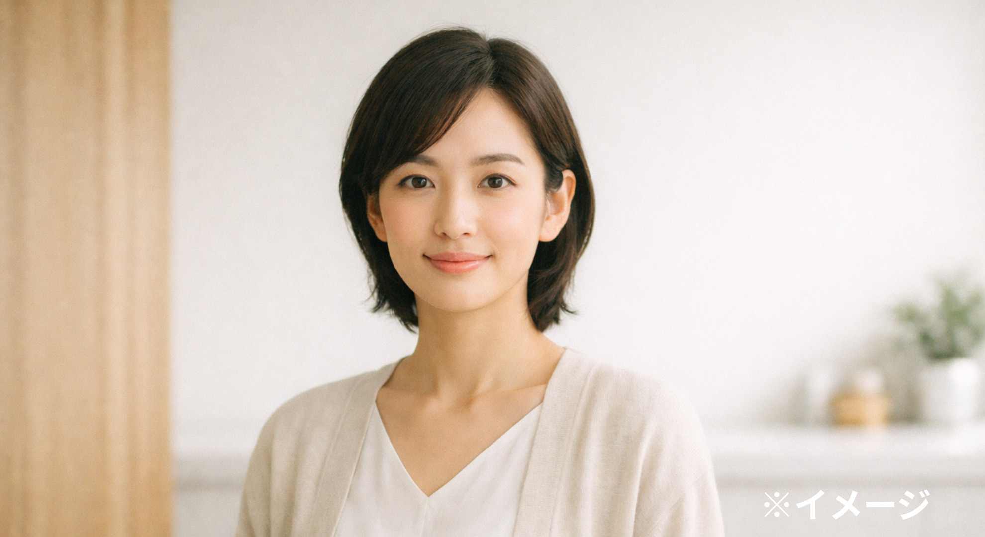 穏やかな微笑みの女性